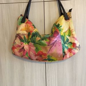 Leather bag with floral design